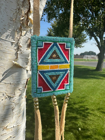 Plateau style beaded medicine bags